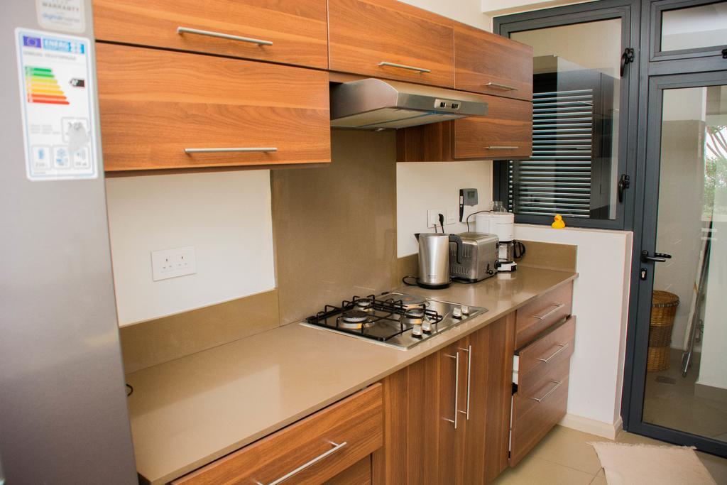 Apartment Azuri Roches Noires Exterior foto